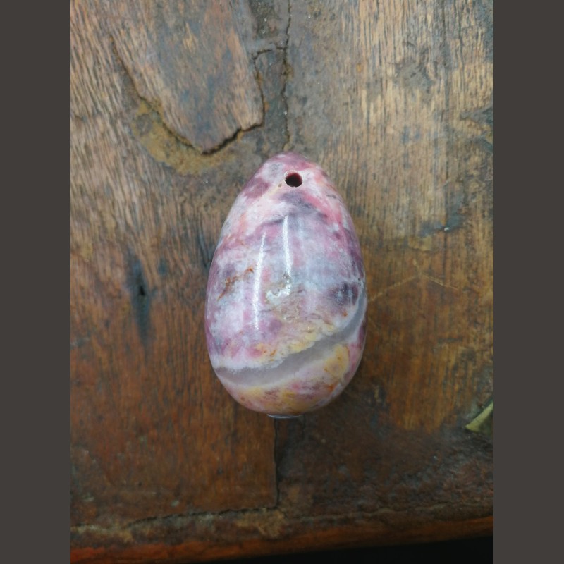 Œuf de rhodonite S percé - 4ème chakra de Pierres du 4ème chakra